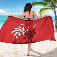 Red personalized sarong with 'YOUR TEXT' and lion graphic, large view from back.