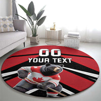 Round red hockey rug with black stripes, Canada bear in uniform holding a stick, 'YOUR TEXT'.