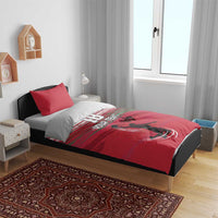 Red basketball duvet set on bed with “YOUR TEXT” and “18” design and player silhouette