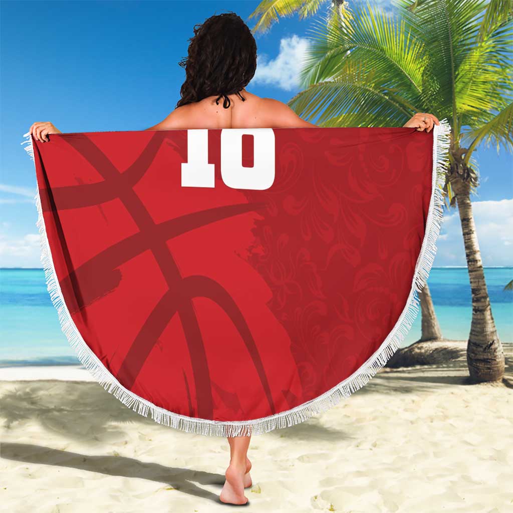 Red round beach blanket with white fringe, crest, custom text and number 10