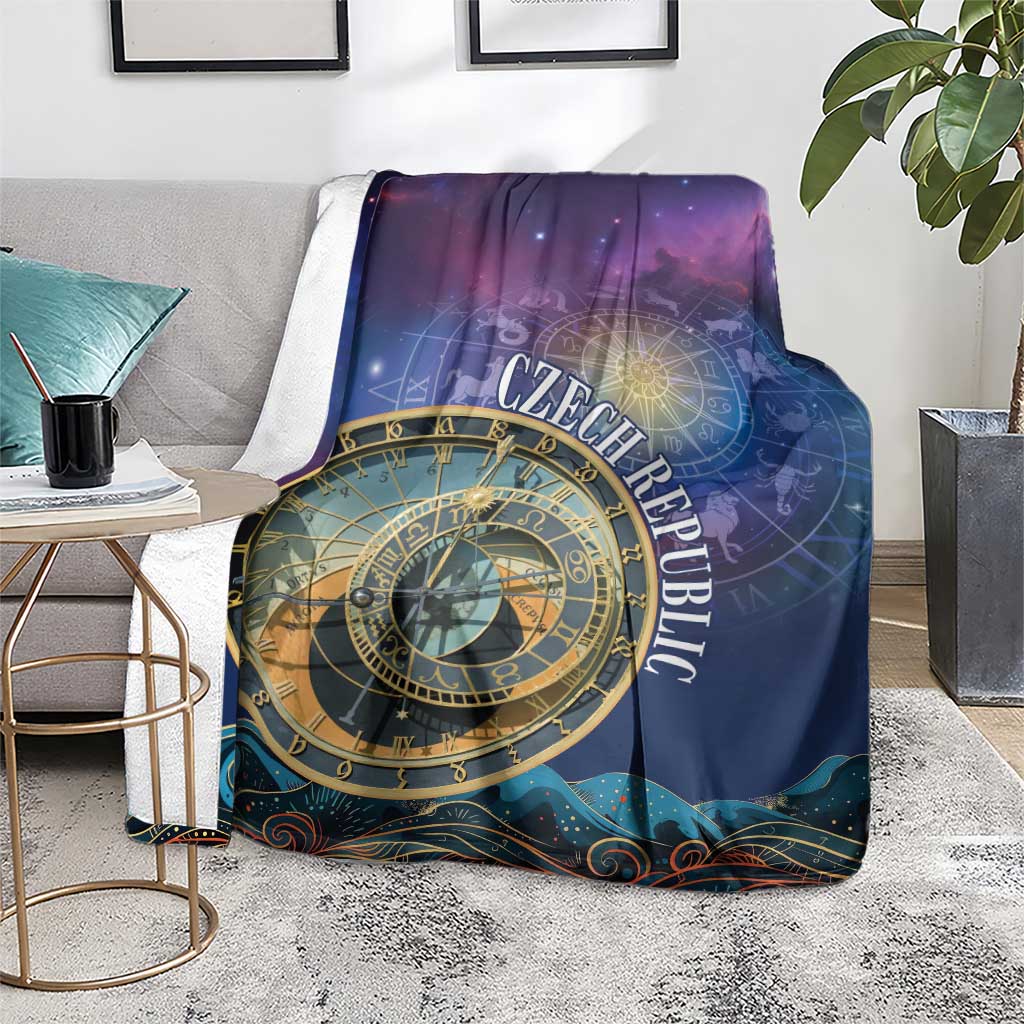 Purple astronomical clock blanket with gold zodiac dial, shown folded on living room floor