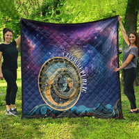 Purple astronomical clock quilt with gold circular emblem and space-themed border on grass