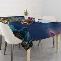 Purple galaxy tablecloth with gold zodiac ring, wave and star motifs over table