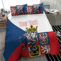 Personalized bedding set showing lion crest and “Your Text” across blue, white, and red.
