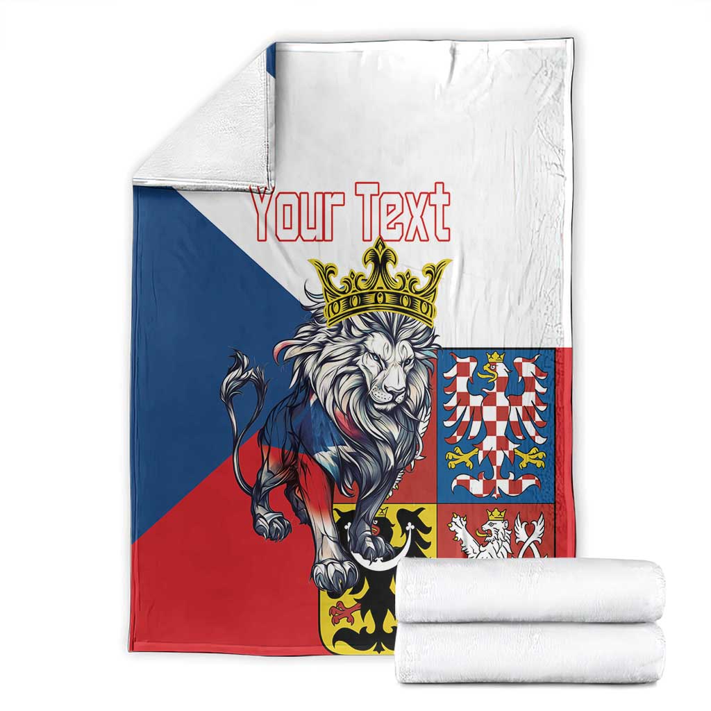 Personalized lion crest blanket folded with “Your Text,” red blue and white panel design