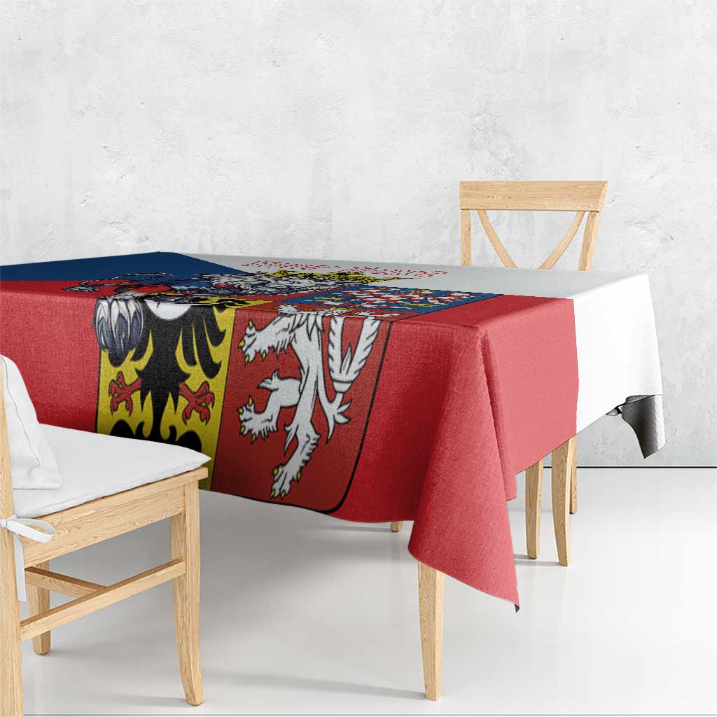 Red tablecloth with multicolor double-tailed lion coat-of-arms panels across the edge
