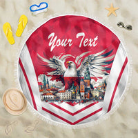 Red and white round beach blanket with fringe, eagle crest and "Your Text" banner.