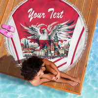 Red center round beach blanket with fringe, eagle artwork and "Your Text" on white panel.