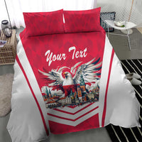 Red and white bedding set featuring eagle graphic, city illustration, and chevron stripe design