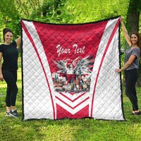 Red and white quilt with eagle crest, “Your Text” script, and red border stripes