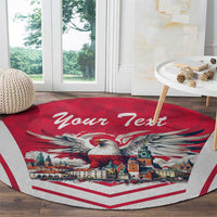 Red round carpet rug with eagle and town illustration, 'Your Text' on white border