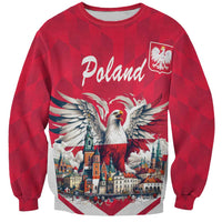 Red sweatshirt with Poland text and white-tailed eagle graphic, cityscape and crest