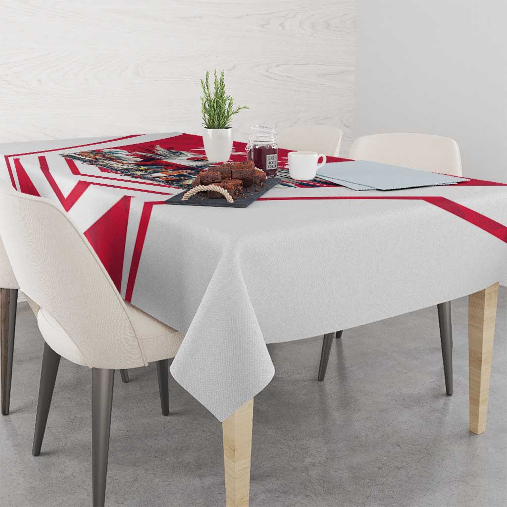 Personalized tablecloth on dining table with red-and-white geometric chevrons and eagle print