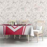 Personalized tablecloth on long table with red-and-white chevron panel and eagle print