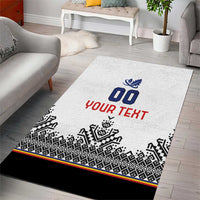 White area rug with blue logo and red YOUR TEXT, black geometric edge