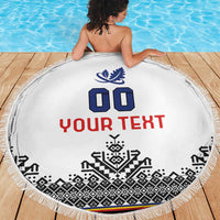 Round white beach blanket with fringe, blue emblem, YOUR TEXT and black patterned edge