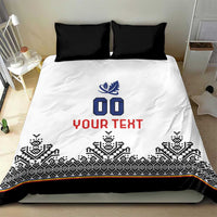 White bedding set featuring blue crest, '00' and red 'YOUR TEXT' over black Nordic border