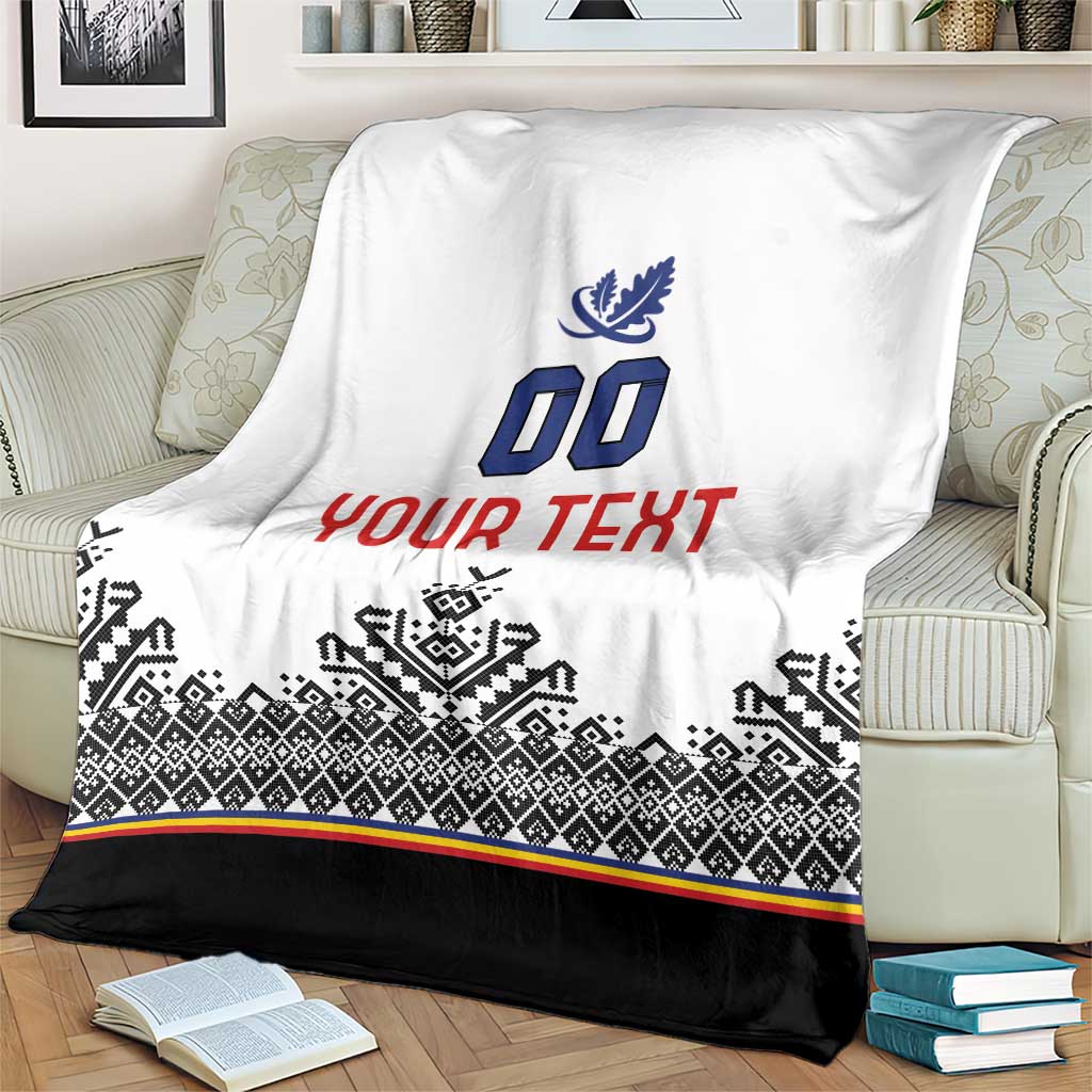 Draped white blanket with blue crest and 00, red YOUR TEXT, black patterned hem and stripe