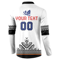 Back of white rugby button sweatshirt with blue leaf, YOUR TEXT 00, and geometric pattern