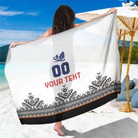 White sarong spread wide with blue/red custom logo text and black bottom trim.