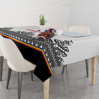 Custom rugby tablecloth on dining table, white-and-black pattern with red yellow green stripe