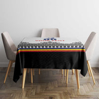 Custom rugby tablecloth on table with two chairs, “00 YOUR TEXT” and patterned border