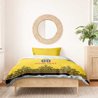 Yellow duvet and pillow bedding set with 00 emblem, YOUR TEXT print, and black border