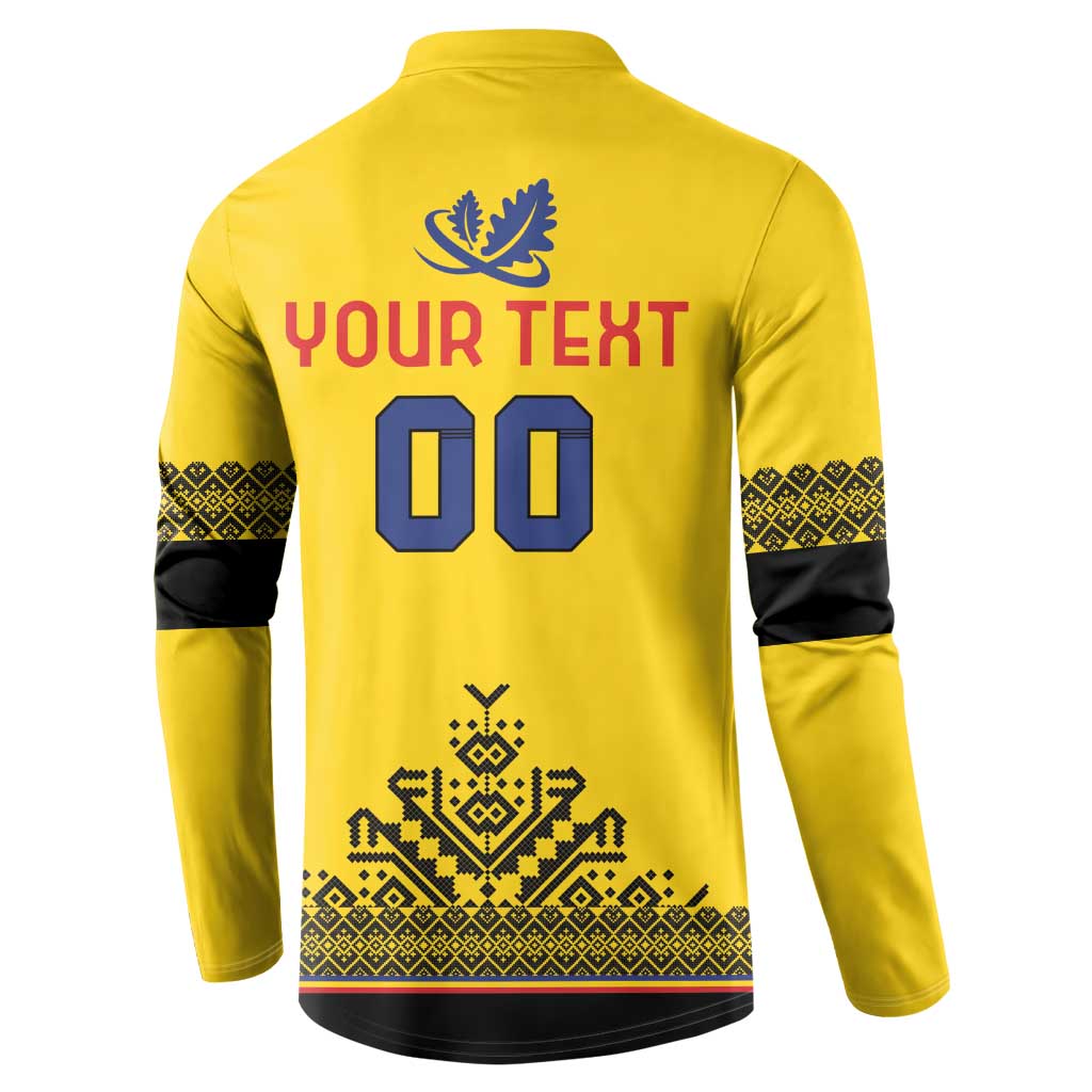 Back of yellow rugby button sweatshirt with blue crest, YOUR TEXT 00, and patterned hem