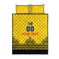 Yellow quilt bed set with 2 pillows, '00' and 'YOUR TEXT' centered, geometric trim