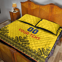 Yellow quilt bed set with 2 pillows, '00' and 'YOUR TEXT' across quilt, black trim