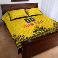 Yellow quilt bed set with 2 pillows, '00' and 'YOUR TEXT' print, geometric bottom border