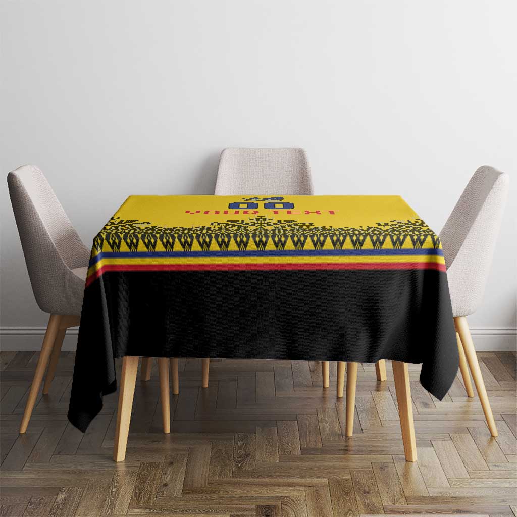 Yellow and black rugby-style tablecloth with red and blue trim, centered on a dining table.