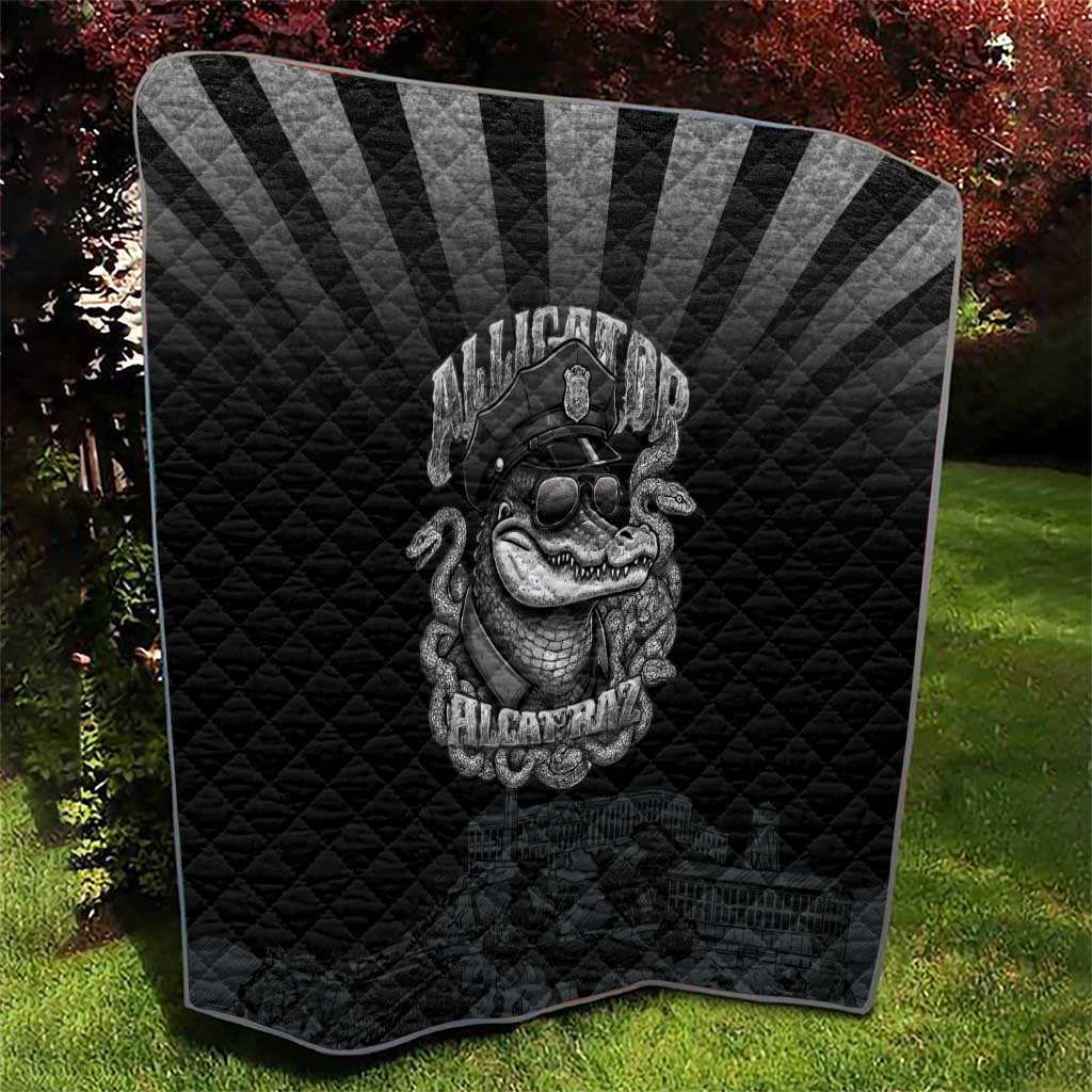 Black quilt with diamond stitching and centered grayscale alligator police graphic