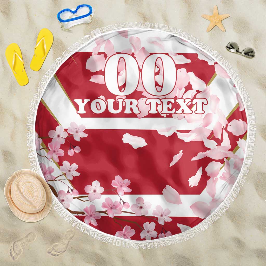 Round red beach blanket with "YOUR TEXT" pink floral pattern, white fringe border
