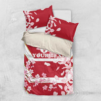 Red cherry blossom bedding set with matching pillowcases and custom text band