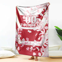Custom rugby blanket, red cherry blossoms and petals print with '00 YOUR TEXT' text