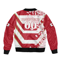 Red bomber jacket back with black ribbed trim, diagonal stripes, cherry blossoms, 'YOUR TEXT'