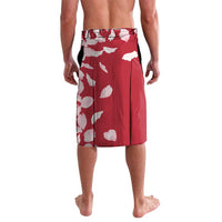 Knee-length red shorts with white petal print and elastic waistband