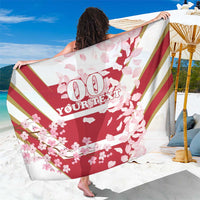 Red cherry blossom sarong with gold and green diagonal stripes, custom text panel