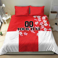 Red and white bedding set with wave pattern, cherry blossoms, and YOUR TEXT printed; duvet and 2 pillows