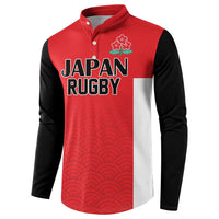 Rugby button sweatshirt in red and black with white panels, wave pattern, 'JAPAN RUGBY' print.