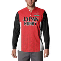Rugby button sweatshirt in red and black with wave pattern and front 'JAPAN RUGBY' logo, worn.