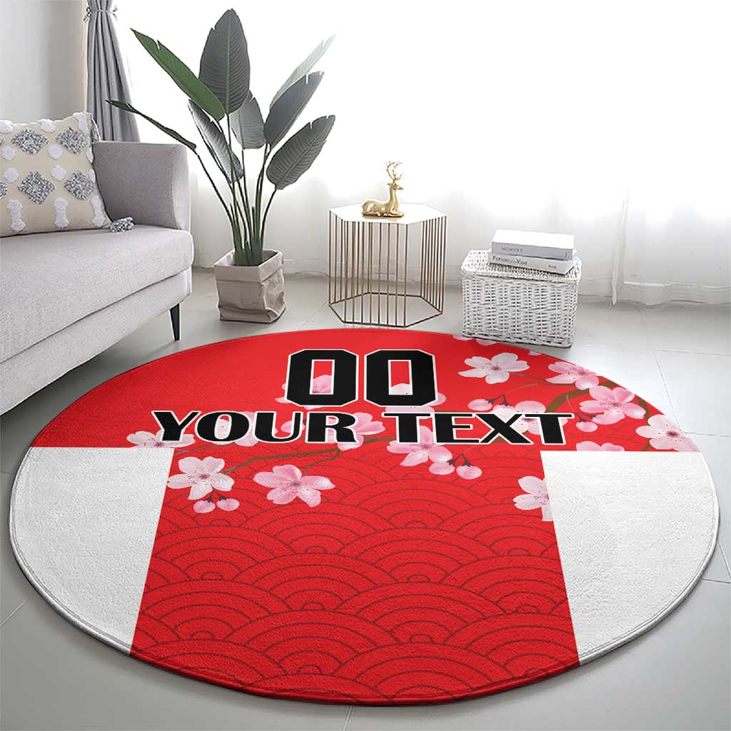 Red round carpet with concentric wave pattern, cherry blossoms, and centered custom text.