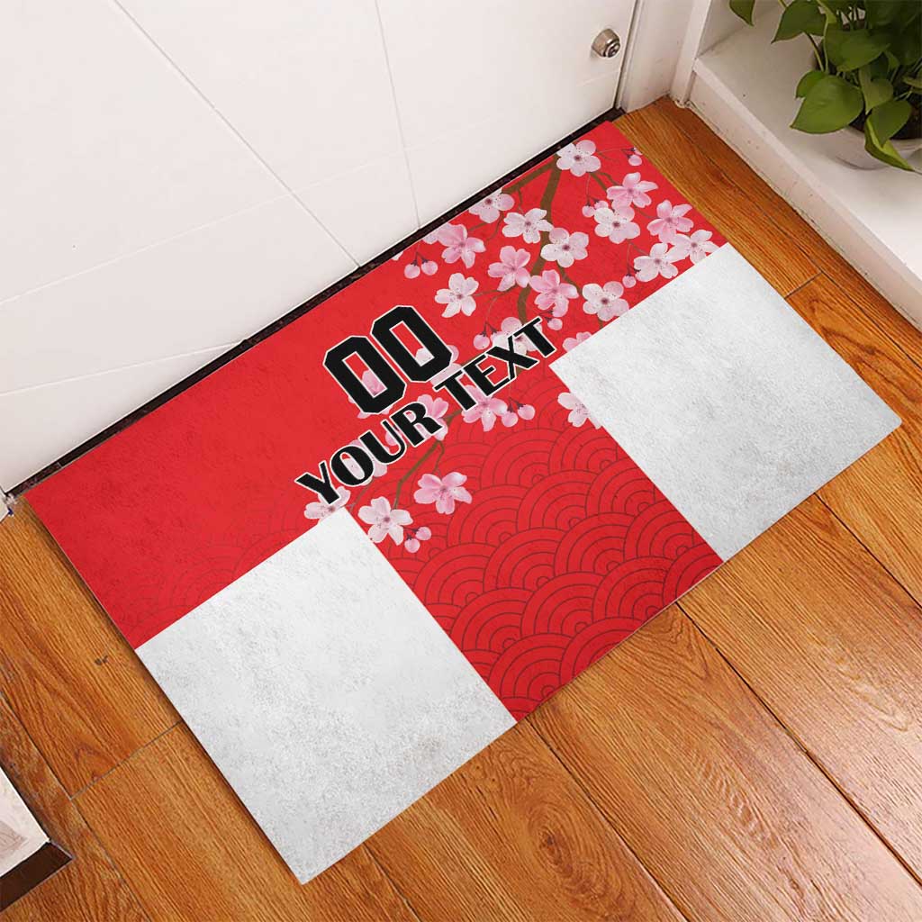 Red rectangular doormat with cherry blossoms and wave pattern, white side panel
