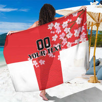 Red seamless sarong with wave pattern, cherry blossoms, and custom text print