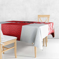 Red Japanese waves tablecloth draped over table with blossom panel