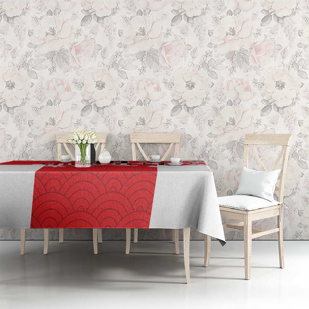 Red Japanese waves tablecloth with cherry blossom accents on tabletop