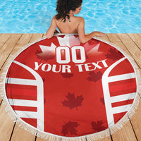 Red round beach blanket with '00 YOUR TEXT' maple-leaf stars and fringed edge
