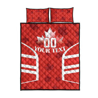 Red quilt bed set with white Canada flag graphics and '00 YOUR TEXT', quilted