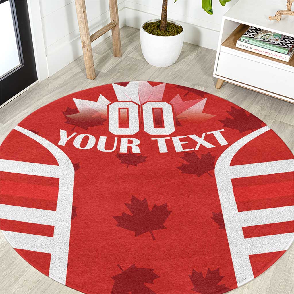 Red round rug with rugby jersey front graphic, white sleeve stripes, maple leaves and custom text